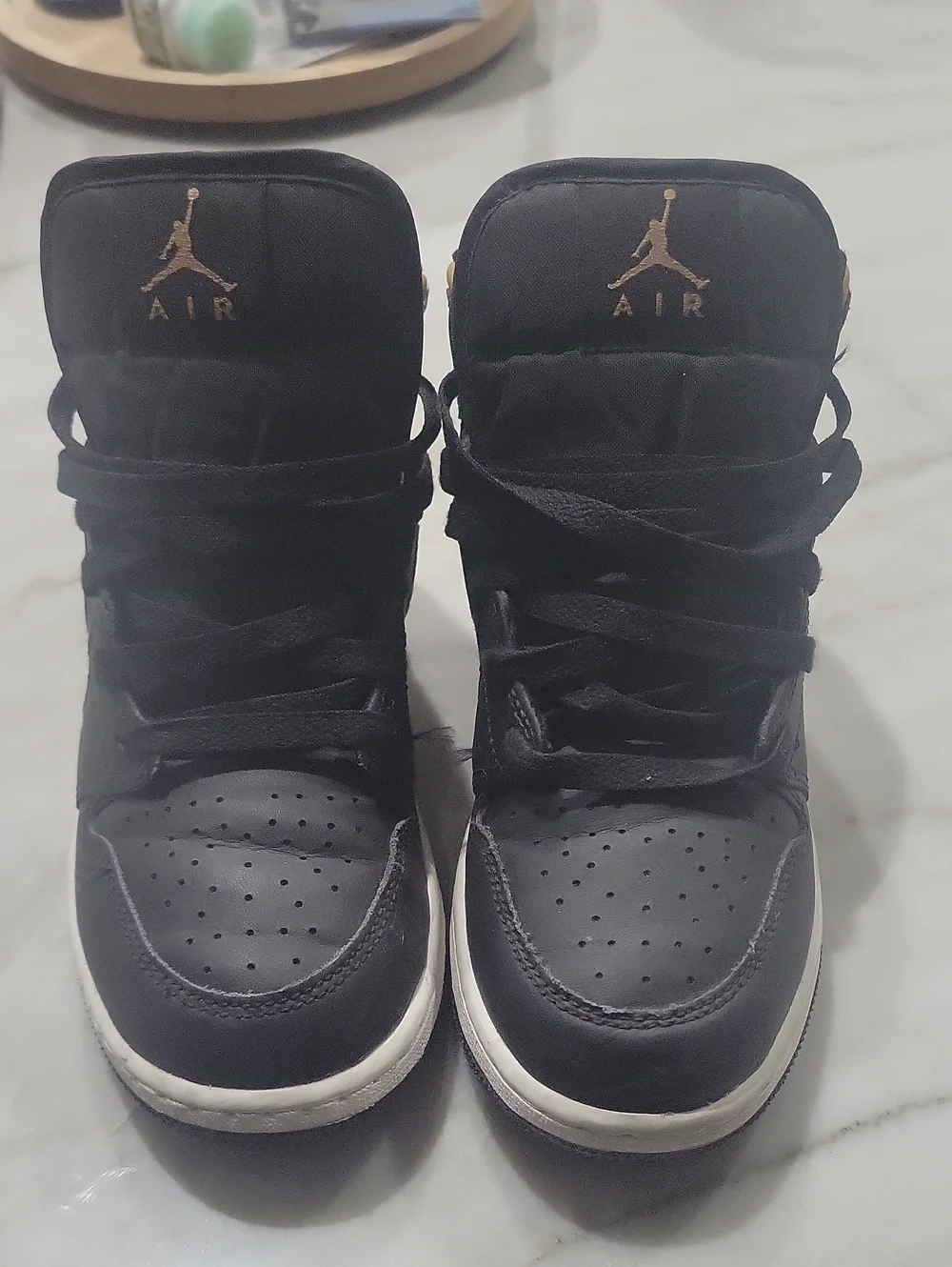 Nike Black High-Top Sneakers with Gold Jumpman